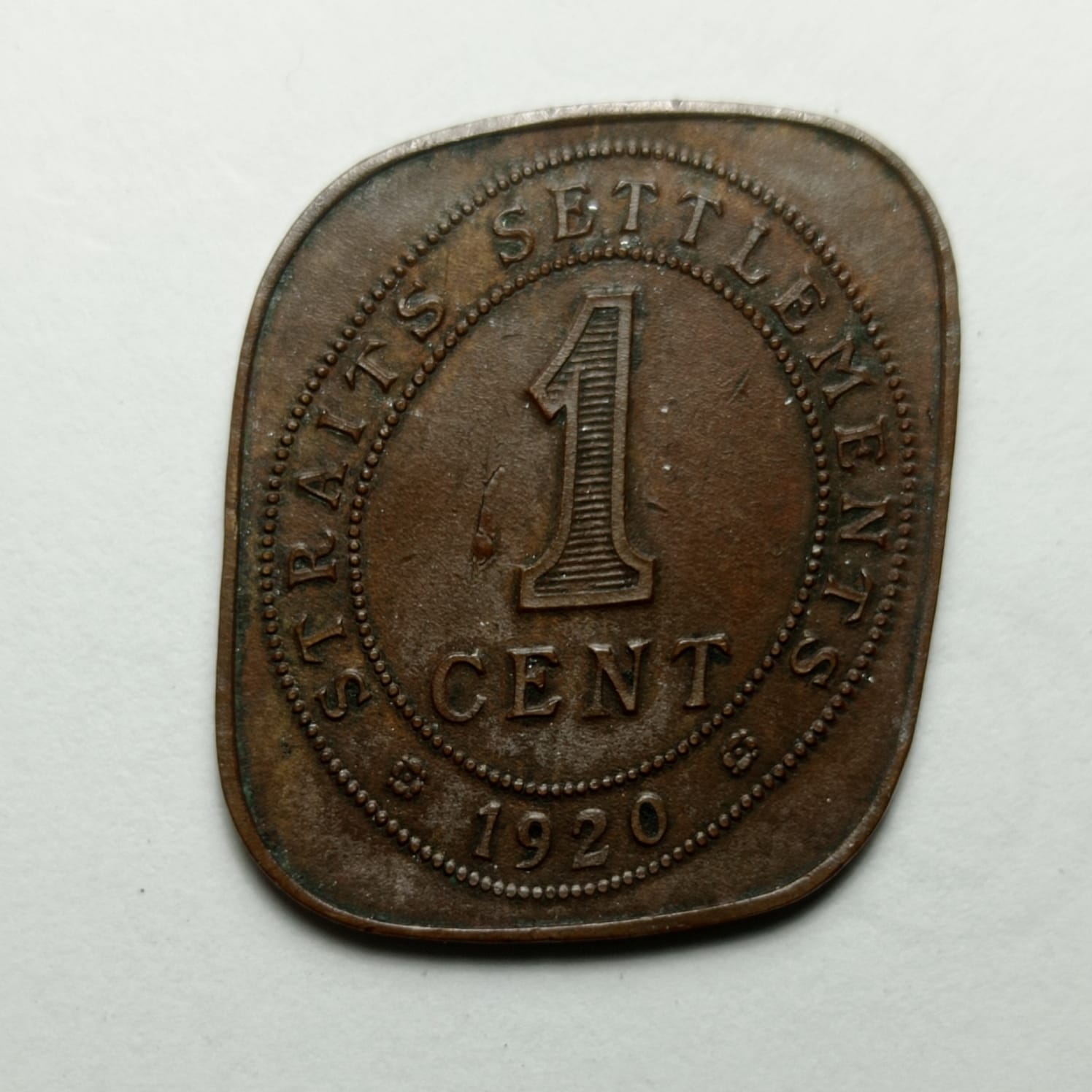 1920-Straits-Settlement-1-Cent;-How-Is-This-Peculiar-Shape-Possible?